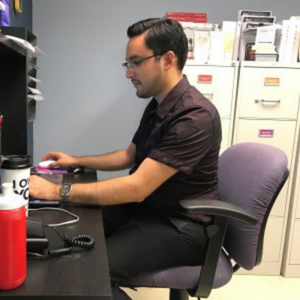 Advisor staring at his computer screen
